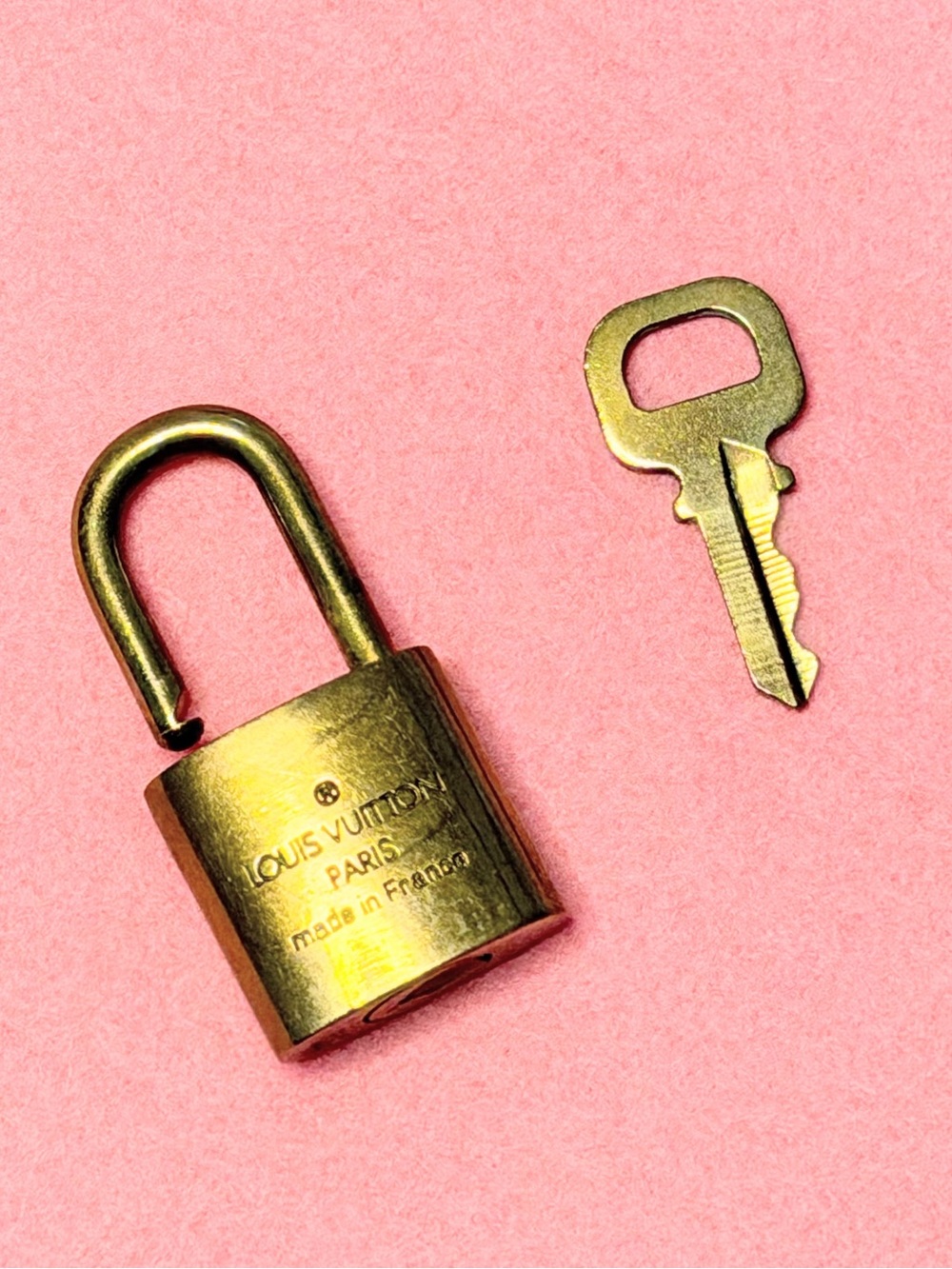 Louis Vuitton Gold Padlock and Key Set
